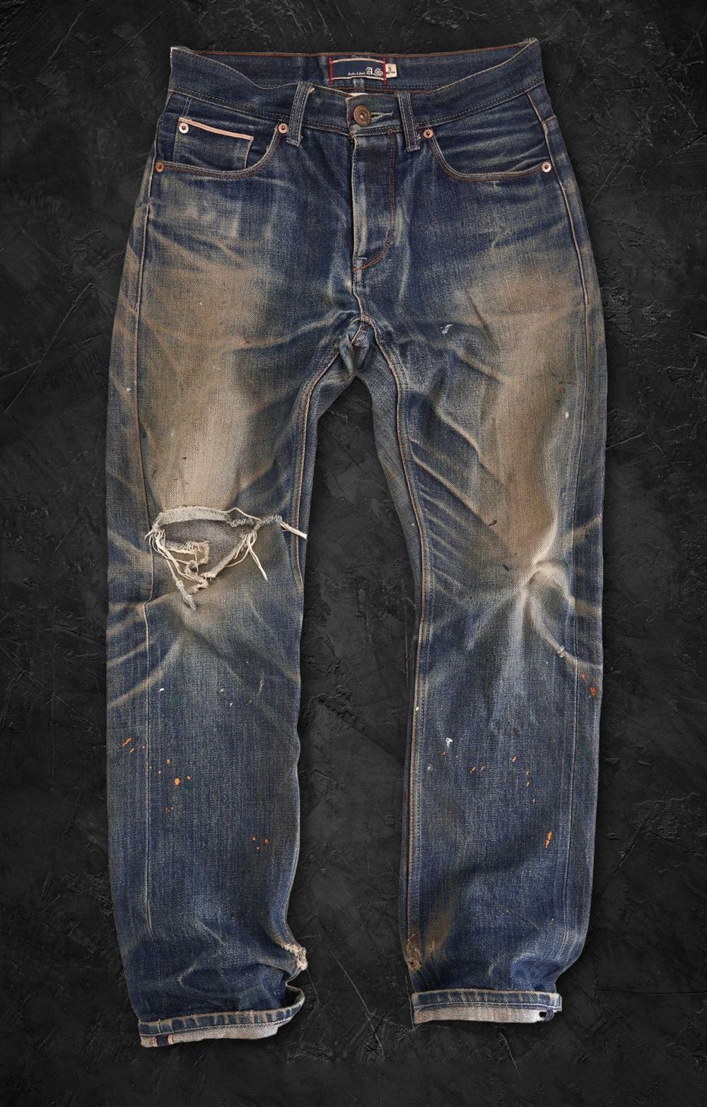 Vintage-washed denim jeans finished at HuaFeng laundry